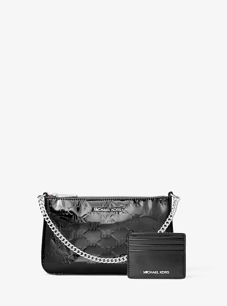 Macys #ad : Jet Set Patent Logo Debossed Pochette and Card Case Gift Set for $94.50 (reg $378) + Free Shipping.